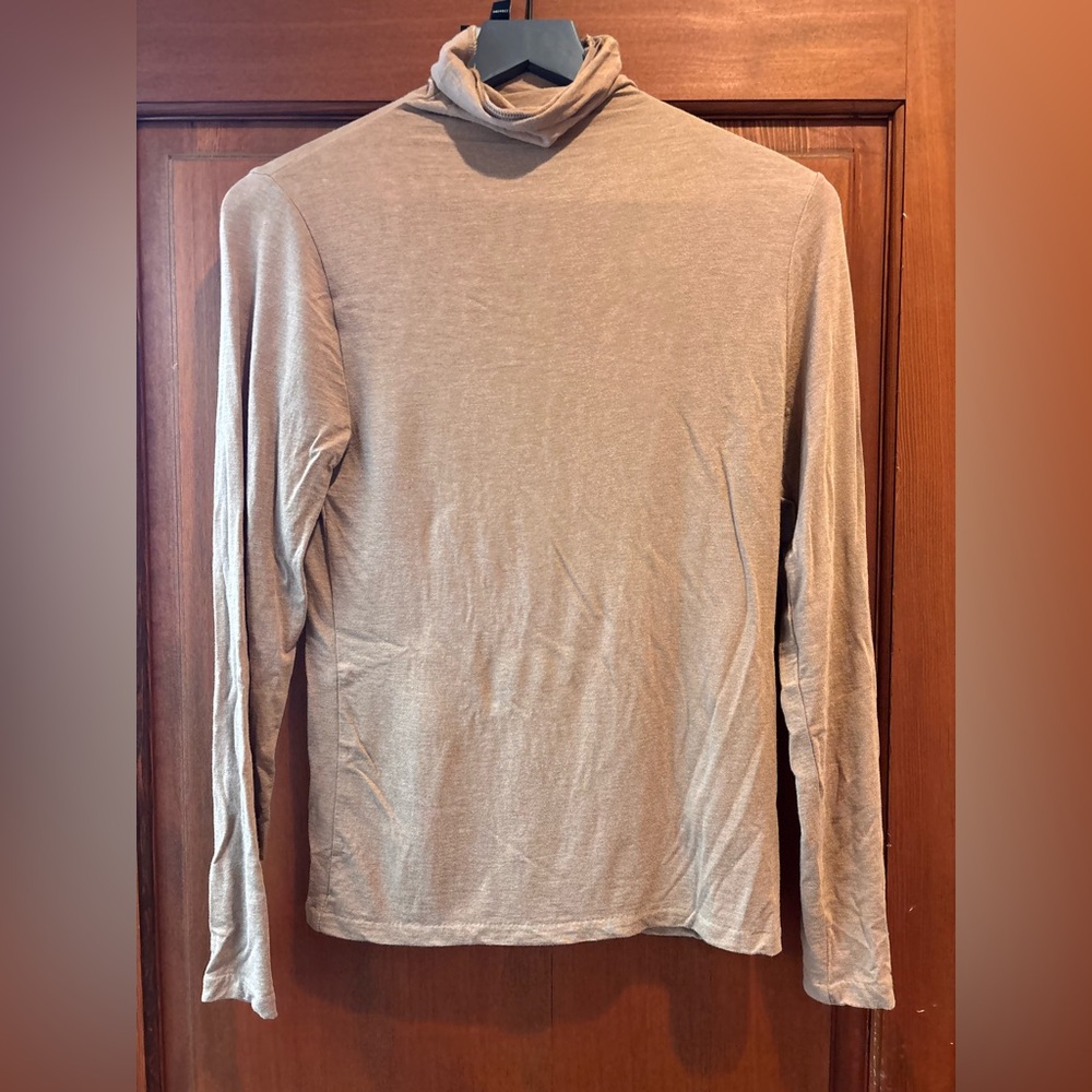 Woman’s Tan turtleneck